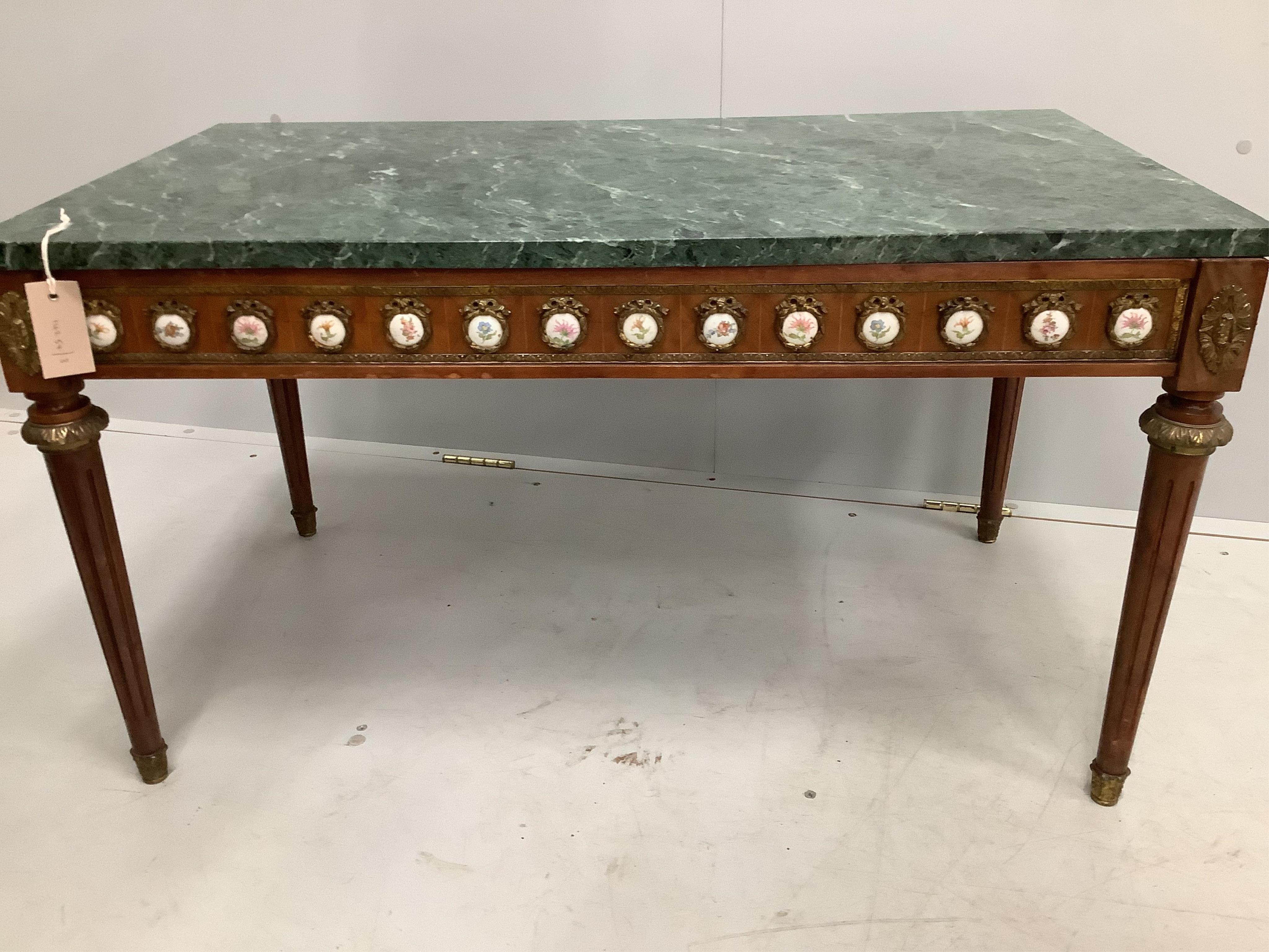 A Louis XVI style rectangular gilt metal and porcelain mounted marble top mahogany coffee table, width 92cm, depth 52cm, height 51cm. Condition - fair